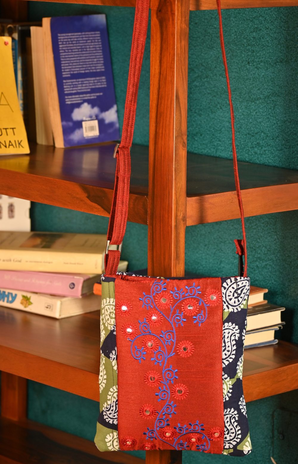 INDHA Sling Bag| Handcrafted Kantha Embroidered Sling Bag| Red Dupion Silk Sling Bag| Hand Embroidered Blue Design Pattern | Blue And Green Cotton Sling Bag| Hand Block Printed Traditional White Design Motif |
