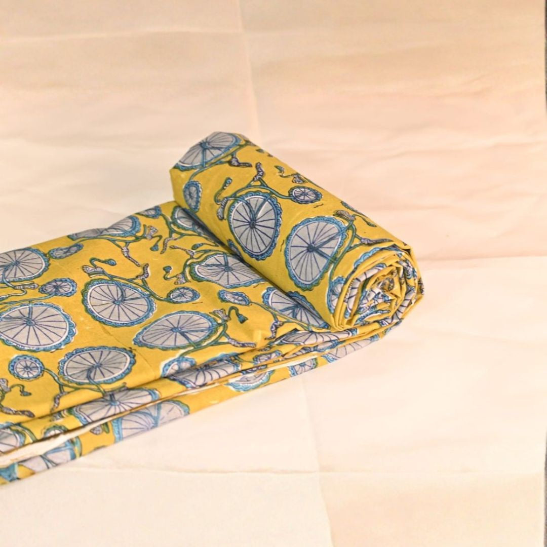 INDHA Hand Block-Printed Cotton Fabric | Grey Bicycle Design Motif Yellow Cotton Fabric | Hand Block Printed Fabric | Home Utility | Fashion Utility | Gifting | Gifts For Him | Gifts For Her | Home Furnishing | Jaipuri Block Print Fabric