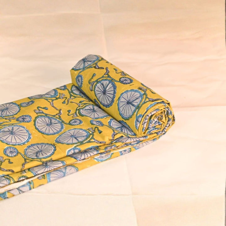 INDHA Hand Block-Printed Cotton Fabric | Grey Bicycle Design Motif Yellow Cotton Fabric | Hand Block Printed Fabric | Home Utility | Fashion Utility | Gifting | Gifts For Him | Gifts For Her | Home Furnishing | Jaipuri Block Print Fabric
