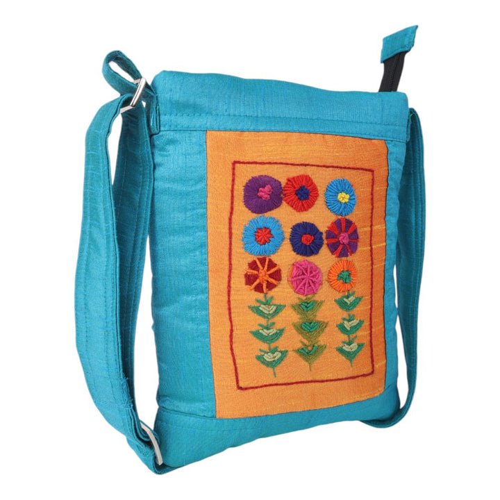 Indha Sky Blue Floral Embroidered Silk Sling Bag – A Charming and Practical Daily Accessory