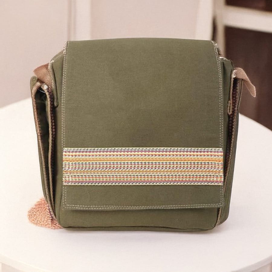 Handcrafted cotton canvas sling bag with multicolor niwar strap