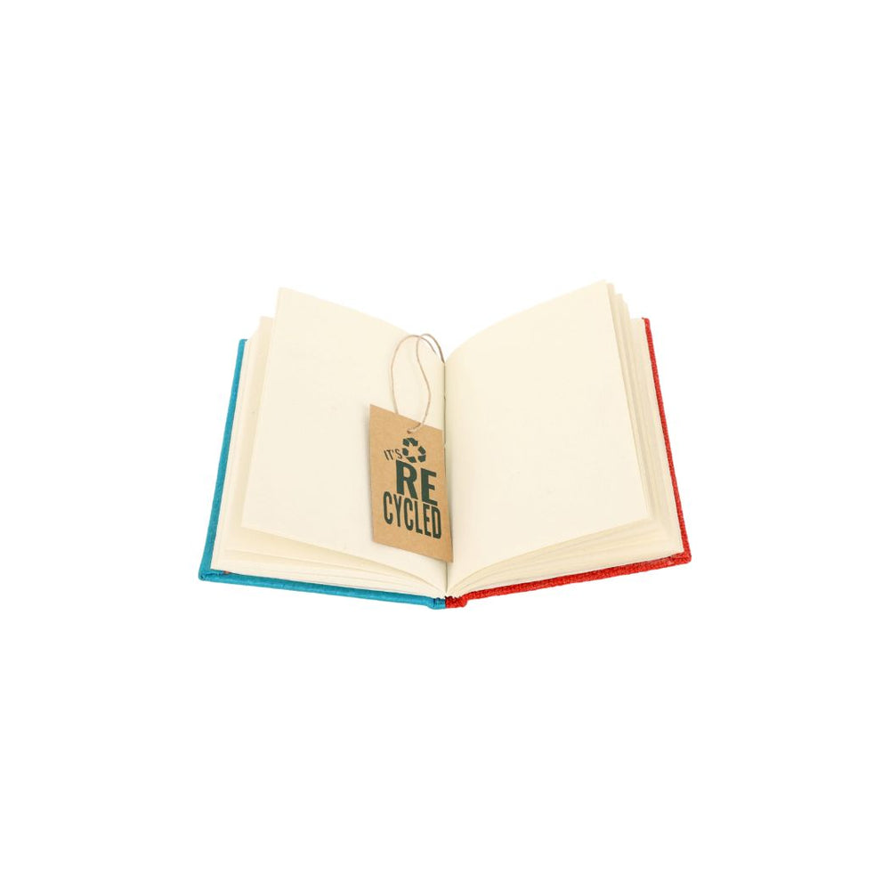 Open handmade diary with a 50+ recycled paper label on a white background