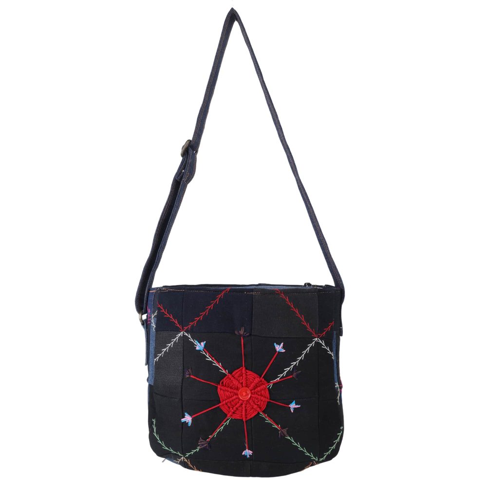 Crochet flower embellished denim bag front view