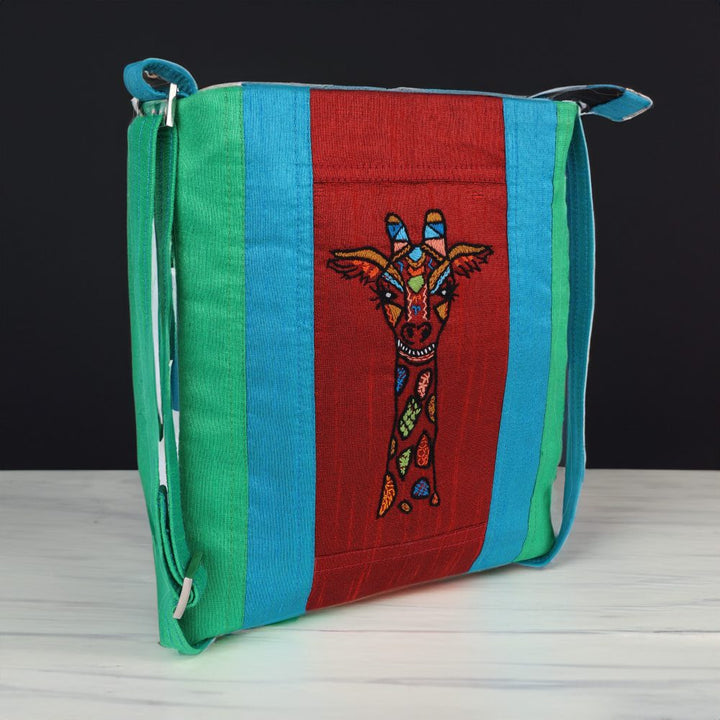 Indha Sling Bag| Handcrafted Sling Bag| Maroon, Green And Sky Blue Dupion Silk Sling Bag| Hand Embroidered Chain Stitch And Kantha Work Multicolor Giraffe Face Design | Travel Utility | Cross Body Bag