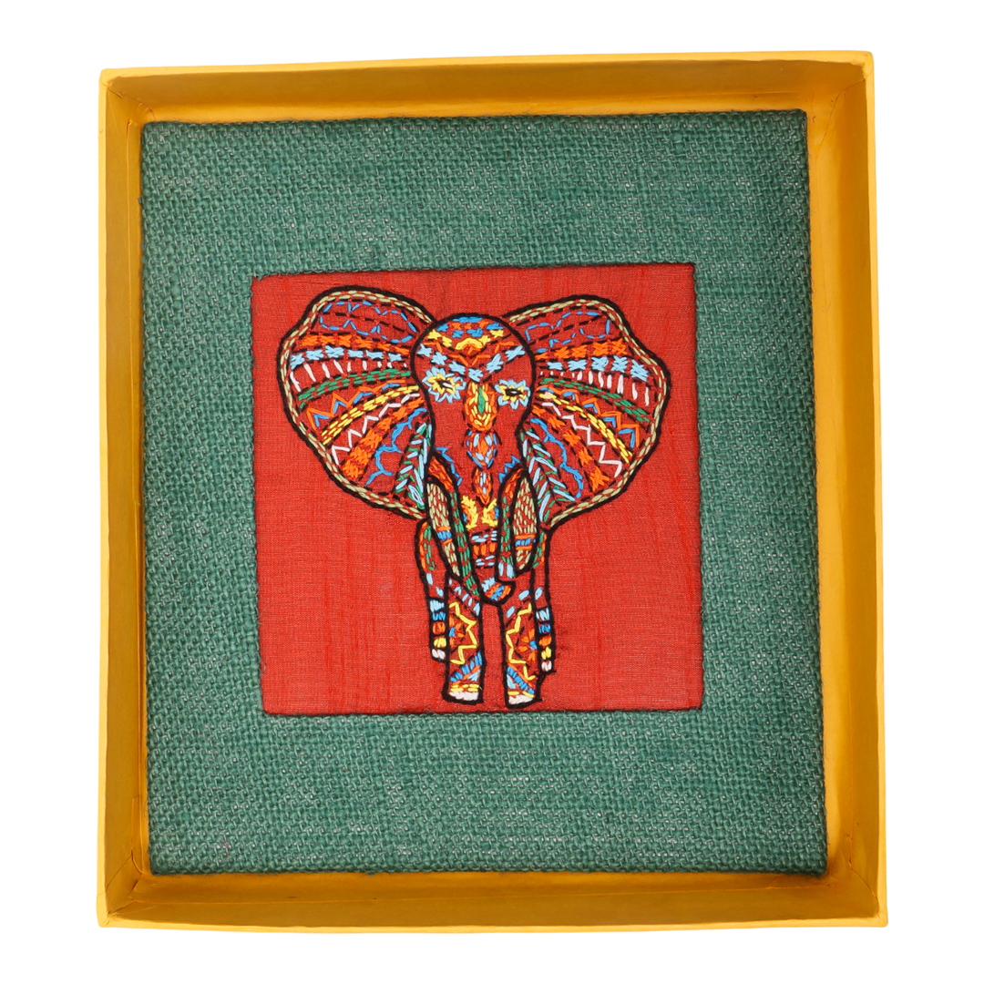 Indha Hand-Embroidered African Elephant – Silk Textile Art with Mini Wooden Easel A vibrant elephant motif stitched on rich silk—tabletop ready, gift-ready