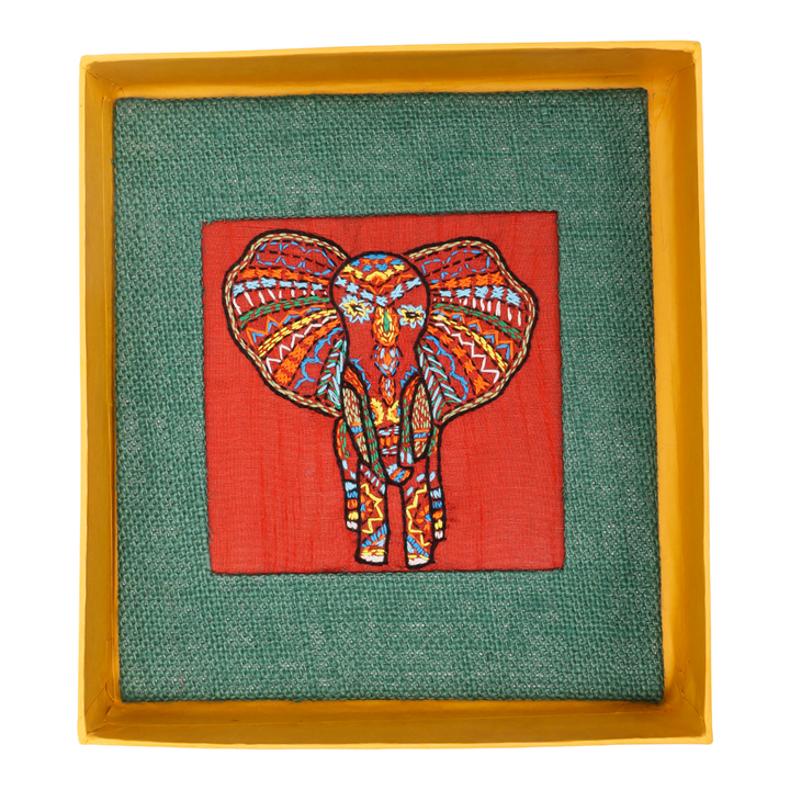 Indha Hand-Embroidered African Elephant – Silk Textile Art with Mini Wooden Easel A vibrant elephant motif stitched on rich silk—tabletop ready, gift-ready