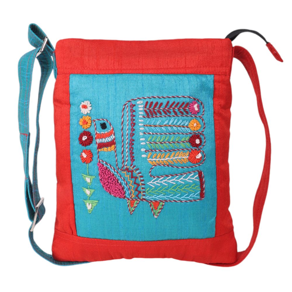 Indha Maroon Silk Sling Bag with Handcrafted Turkey Motif on Sky Blue Dupion – A Stylish and Elegant Accessory