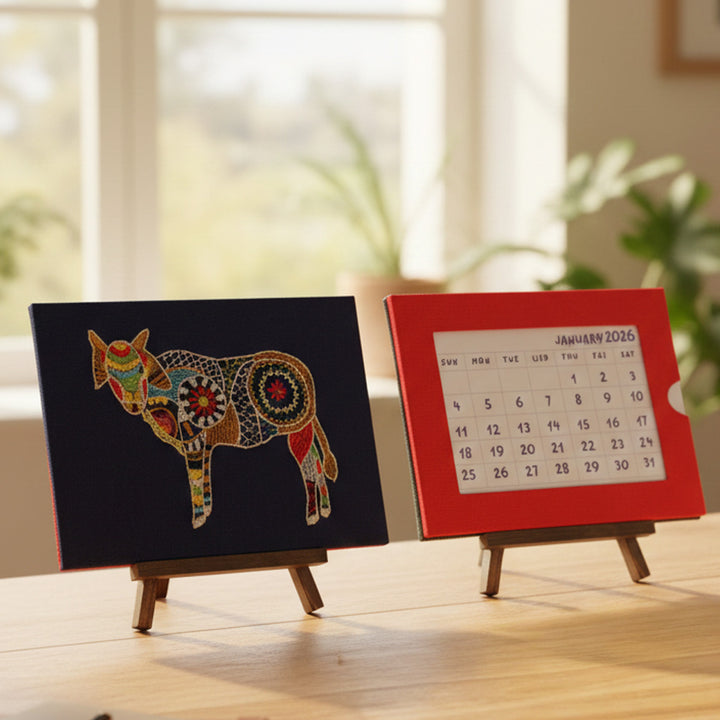 Indha Handcrafted Tabletop Easel Stand Calendar — Hand-Embroidered Cow Motif