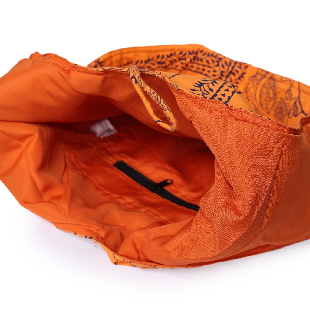 INDHA Woman Abstract Face Motif Hand Block-Printed Orange Cotton Jhola Bag With Multicolor Latkan | Multipurpose Cotton Bag | Hand Block Printed Bag | Eco-Friendly | Gifting |Shopping Bag | Tradiitional Cotton Bag