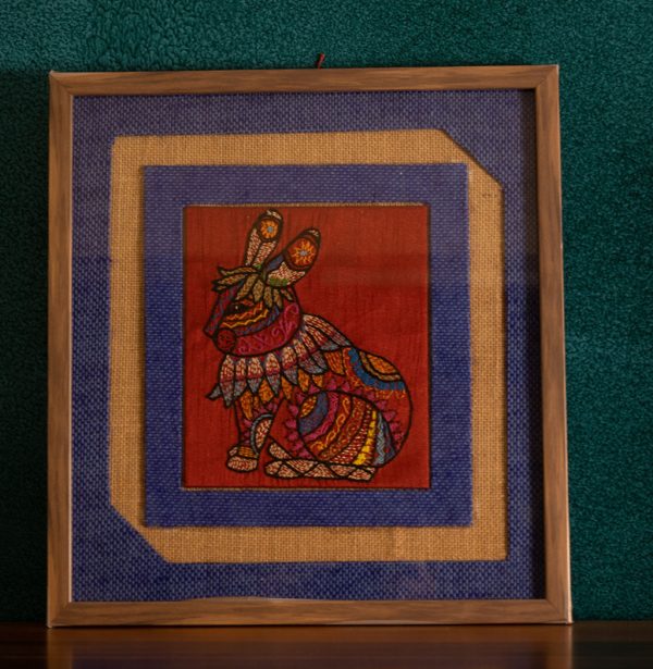 INDHA Handcrafted Wooden Framed Wall Décor Natural And Blue Jute Wall Décor Reprocessed Wood Wooden Frame Maroon Dupion Silk Hand Embroidered Chain Stitch And Kantha Work Multicolor Rabbit Design Hand Embroidered Wall Décor